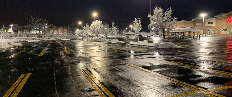 A commercial parking lot in Allentown that we plowed and applied a deicing service.